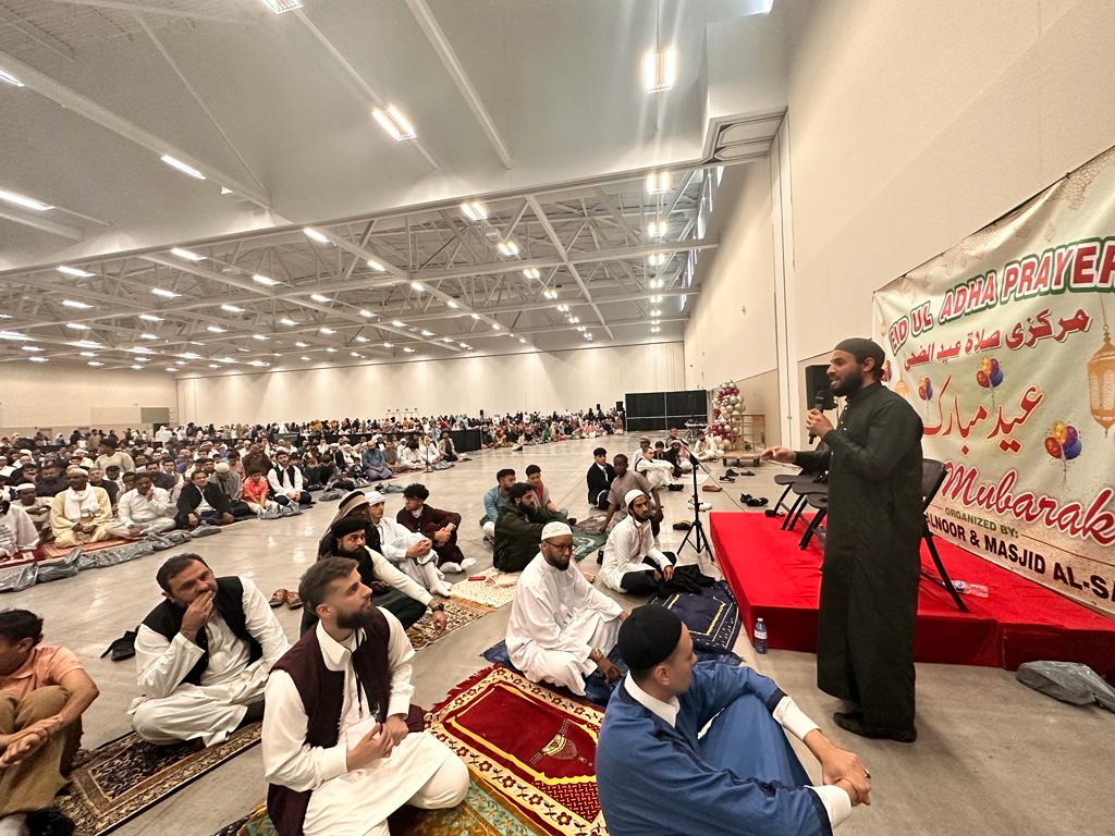 Speaker addressing the community